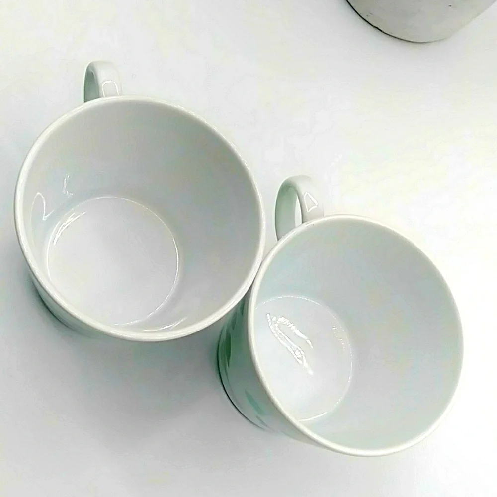 2 IKEA Stilenlig White Mugs With Ginko Leaves.